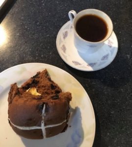 double chocolate chip hot cross bun and esepresso coffee