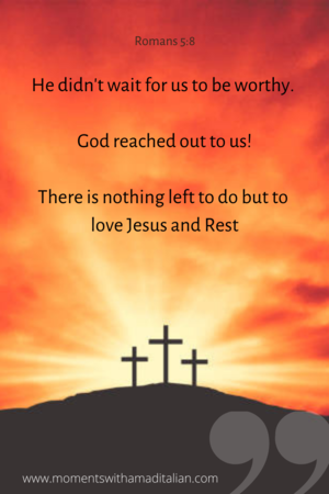 3 crosses on a hill at sunset